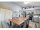 Bright kitchen with stainless steel appliances and an island at 1712 Palo Alto Ave, The Villages, FL 32159