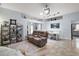 Bright living room with recessed lighting, a ceiling fan, and comfortable seating at 1712 Palo Alto Ave, The Villages, FL 32159