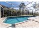 Inviting screened pool with a spacious patio at 17120 Cypresswood Way, Clermont, FL 34714