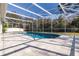 Inviting screened pool with a spacious patio at 17120 Cypresswood Way, Clermont, FL 34714