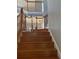 Elegant wooden staircase with a classic design at 1735 Southern Oak Loop, Minneola, FL 34715