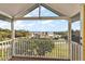 Screened balcony overlooking the lake and neighborhood at 17640 Las Brisas Ct, Winter Garden, FL 34787