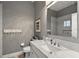 Bathroom with marble vanity, and a shower with glass block window at 17640 Las Brisas Ct, Winter Garden, FL 34787