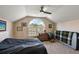 Bedroom with a black comforter and large window at 17640 Las Brisas Ct, Winter Garden, FL 34787