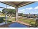 Relaxing screened porch overlooking a lake and other homes at 17640 Las Brisas Ct, Winter Garden, FL 34787