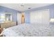 Bedroom with a queen-size bed and ample closet space at 208 Desota Ct, The Villages, FL 32159