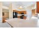 Modern kitchen with stainless steel appliances and an island at 208 Desota Ct, The Villages, FL 32159