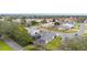 Wide aerial view of the neighborhood with surrounding homes at 2123 Barbosa Ct, The Villages, FL 32159