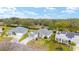 Aerial view of a house with solar panels on a neighboring house at 2123 Barbosa Ct, The Villages, FL 32159