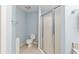 Simple bathroom with toilet and shower stall at 2123 Barbosa Ct, The Villages, FL 32159