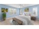 Bright bedroom with light walls and neutral bedding at 2123 Barbosa Ct, The Villages, FL 32159