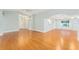 Bright living room with hardwood floors and large windows at 2123 Barbosa Ct, The Villages, FL 32159