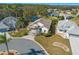 Aerial view of a single-Gathering home in a residential community at 21509 Castle View Ct, Leesburg, FL 34748