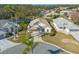 Aerial view of a single-Gathering home in a residential community at 21509 Castle View Ct, Leesburg, FL 34748