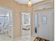 Bright entryway with view of bathroom and bedroom at 21509 Castle View Ct, Leesburg, FL 34748