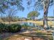 Enjoy serene pond views from the backyard at 21509 Castle View Ct, Leesburg, FL 34748