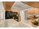 Modern kitchen featuring black appliances and ample counter space at 21721 Loch Haven Pass, Leesburg, FL 34748