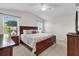 Spacious main bedroom with king-size bed and ample closet space at 2214 Quinn Ln, The Villages, FL 32162