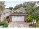 House exterior view with paved driveway at 2334 Fenton Ave, Clermont, FL 34711