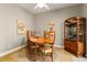 Dining room with wood table and chairs, and buffet at 2334 Fenton Ave, Clermont, FL 34711