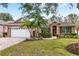 Charming one-story home with landscaped yard at 2334 Fenton Ave, Clermont, FL 34711