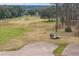 Golf course with sand trap and golf cart at 2334 Fenton Ave, Clermont, FL 34711