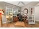 Functional home office featuring a desk and built-in Murphy bed at 2334 Fenton Ave, Clermont, FL 34711