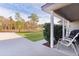 View from the front porch, showing a yard and trees at 238 Oak Lane Cir, Ocala, FL 34472