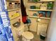 Small bathroom with toilet and shelving at 2403 County Road 416N, Lake Panasoffkee, FL 33538