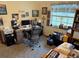 Home office with desk, computer, and printer at 2403 County Road 416N, Lake Panasoffkee, FL 33538