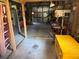 Spacious workshop interior with various tools and equipment at 2403 County Road 416N, Lake Panasoffkee, FL 33538