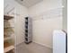 Spacious closet with built in shelving and drawers at 25107 Meriweather Rd, Leesburg, FL 34748