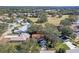 Aerial view showcasing home's location in a golf course community at 25236 River Crest Dr, Leesburg, FL 34748