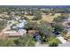 Aerial view of home and surrounding golf course community at 25236 River Crest Dr, Leesburg, FL 34748