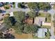 Aerial view of single-Gathering home nestled in a quiet residential neighborhood at 25236 River Crest Dr, Leesburg, FL 34748