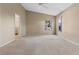 Spacious bedroom with neutral carpeting and ample natural light at 25236 River Crest Dr, Leesburg, FL 34748