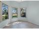 Bright breakfast nook showcasing a view of the backyard at 25236 River Crest Dr, Leesburg, FL 34748