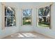 Breakfast nook with large windows offering a view of the outdoors at 25236 River Crest Dr, Leesburg, FL 34748