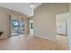 Spacious living area with light walls and wood-look floors at 25236 River Crest Dr, Leesburg, FL 34748