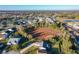 Aerial view showcasing a neighborhood and a large lot at 25339 Hibiscus St, Leesburg, FL 34748