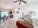 Bright living room with hardwood floors, ceiling fan, and comfortable seating at 25339 Hibiscus St, Leesburg, FL 34748