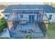 Overhead view of a screened patio with seating at 25339 Hibiscus St, Leesburg, FL 34748