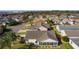 House with sunroom addition, viewed from above at 2565 Edenville Path, The Villages, FL 32162