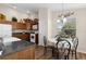 Kitchen nook with a round table and four chairs at 2565 Edenville Path, The Villages, FL 32162