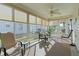 Relaxing sunroom with comfortable seating and natural light at 2565 Edenville Path, The Villages, FL 32162