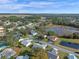 Aerial view showcasing community and waterfront at 26154 Newcombe Cir, Leesburg, FL 34748