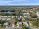 Aerial view of community, highlighting the neighborhood's landscape and layout at 26154 Newcombe Cir, Leesburg, FL 34748