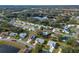 Aerial view of home and neighborhood, showcasing landscape and location at 26154 Newcombe Cir, Leesburg, FL 34748