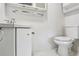 Simple bathroom with toilet and vanity at 2753 Vindale Rd, Tavares, FL 32778