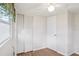 Bright bedroom with wood floors and large closet at 2753 Vindale Rd, Tavares, FL 32778